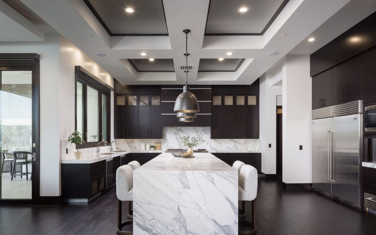Custom Kitchen with Coffered Ceiling and Marble Waterfall Island